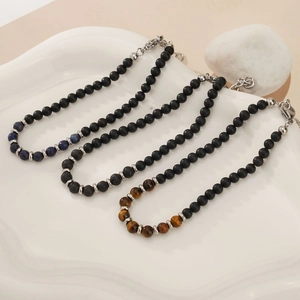Men's natural lapis, tiger eye, and lava stone beaded bracelet set with silver clasps