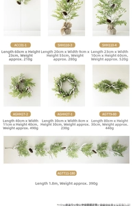 Collection of Christmas wreaths and garlands with white antlers, pine cones and berries