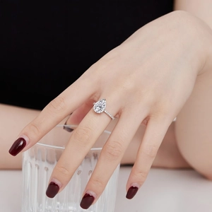Elegant S925 sterling silver ring with a pear-cut water drop zircon and micro-pave band