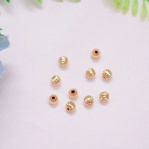 Polished 14K gold-plated pumpkin shape spacer beads for DIY jewelry making