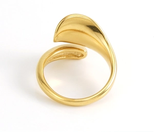Macro shot of minimalist 18k gold-plated stainless steel wrap ring with streamlined design