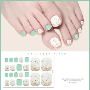 Detail of glitter mint green toe nail stickers with adhesive backing and model display