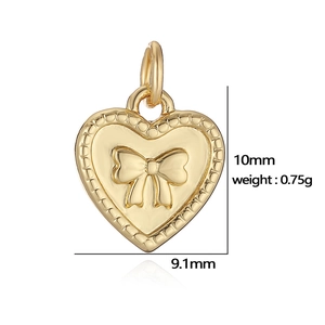 Detail showing heart charm with bow relief, dimensions 10mm by 9.1mm, weighing 0.75g