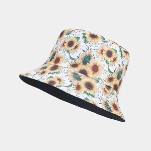 Detail showing sunflower print and reversible black lining of this canvas sun hat