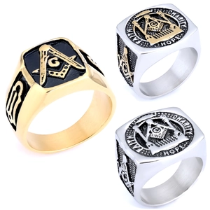 Macro view of square stainless steel Masonic rings with Faith Hope Charity engraving