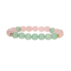 Natural rose quartz and green aventurine beaded bracelet with gold spacers on white background