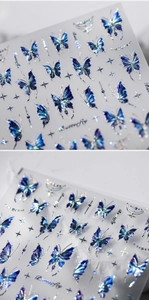 Macro detail of laser iridescent butterfly nail stickers with gold stamping finish