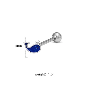 Macro detail of whale-shaped piercing stud with blue glitter finish and 6mm height