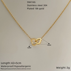 Interlocking double heart necklace in 18k gold plated stainless steel on white background