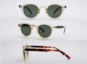 Detailansicht der Vintage-Rundsonnenbrille mit Bernsteinrahmen und Schildpattbügeln