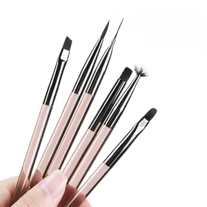 Detail showing 6-piece acrylic nail brush set with brown handles and nylon bristles