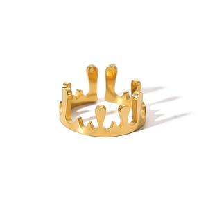 Macro view of gold lava drip irregular open ring with a polished metallic finish