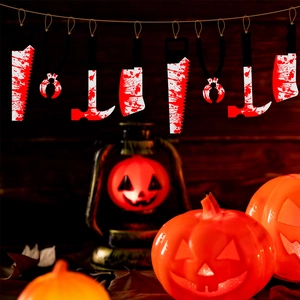 Close-up of bloody tool garland featuring realistic saws and knives for Halloween decor