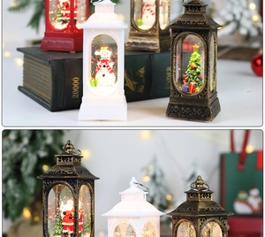 Detail of Christmas lantern with LED snow scene, Santa Claus and festive inner decor