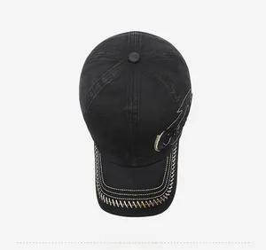 Top view of black washed cotton baseball cap with letter embroidery and vintage stitching