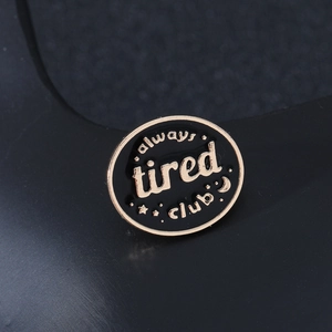 Funny 'Always Tired Club' black enamel pin with gold stars and moon details