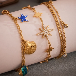 Goldenes mehrlagiges Ozean-Armband mit Seestern und Zirkon-Oktagramm-Stern