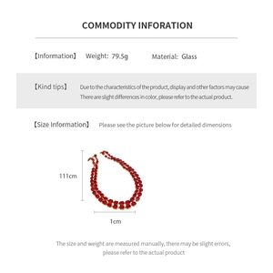 Macro detail of red oval glass beaded necklace showing size and 111cm length parameters