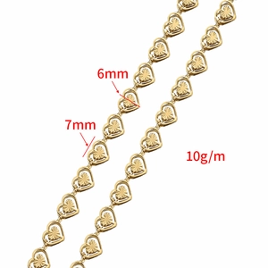 Golden heart-shaped stainless steel chain links with embossed texture and sizing
