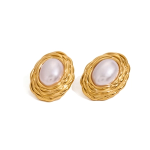 Vintage style gold earrings featuring oval pearls and intricate woven texture borders