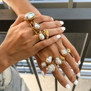 Gold plated titanium steel baroque pearl ring featuring irregular natural aesthetic design
