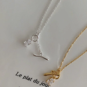 Minimalist s925 silver OT buckle necklace with oval zircon on chic French art paper
