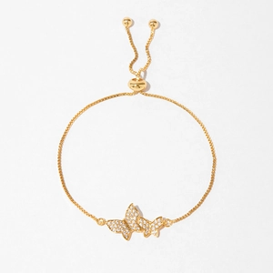 Detail of adjustable gold butterfly bracelet with white zircon micro-pave setting stones