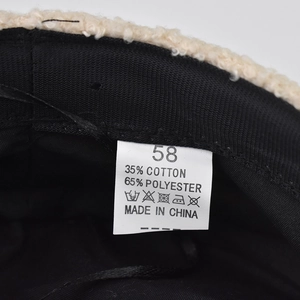Detailed macro view of the inner lining and wash care label showing material composition