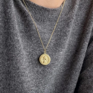 925 Sterling Silver Vintage Elizabeth Coin Pendant Necklace worn over a grey sweater