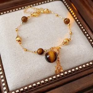 Tigerauge-Stein Armband mit Goldperlen und verstellbarem Design im chinesischen Retro-Stil