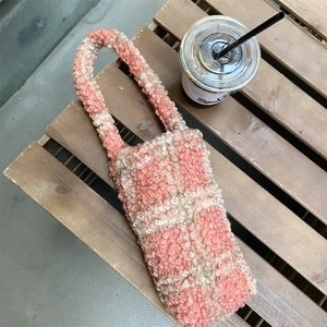 Pink and white checkered plush tote bag with soft fleece texture and long handles