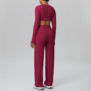 Back view of high-stretch long sleeve berry yoga set with wide leg sport trousers