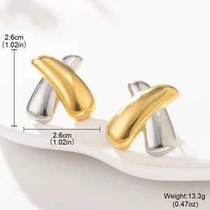 Detailed view of two-tone C-shaped cross earrings with dimensions 2.6cm x 2.6cm