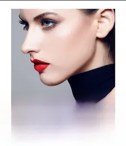Close-up model shot of velvet matte red mascara applied on lashes for a bold makeup look