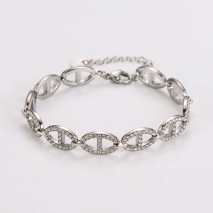 Close-up of silver pig-nose anchor chain bracelet with micro-pave cubic zirconia accents
