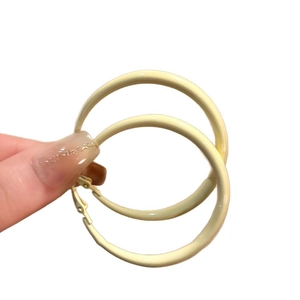 Elegant cream yellow enamel hoop earrings for women with a vintage minimalist style