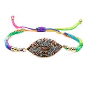 Adjustable colorful braided Evil Eye bracelet with gold-plated charm and vibrant zircons