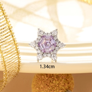 Silver snowflake ear stud with purple stone and zircons, 1.34cm diameter view