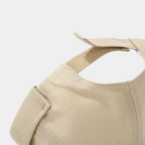 Close-up of adjustable Velcro strap on retro cotton docker hat with premium stitching