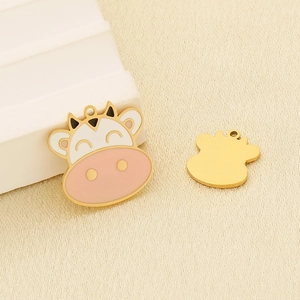 Cartoon cow stainless steel charms with pink enamel and golden finish for jewelry making