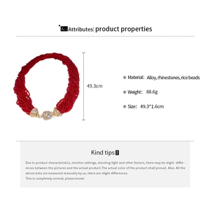 Detailed view of layered red seed bead necklace showing 49.3cm length and 88.6g weight