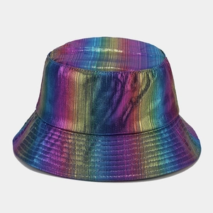 Detail of metallic iridescent bucket hat featuring vertical pleated texture and rainbow gradient