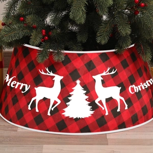 Red and black buffalo plaid Christmas tree collar with white reindeer and tree patterns