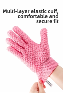 Detail of pink exfoliating shower glove with multi-layer elastic wristband for secure fit