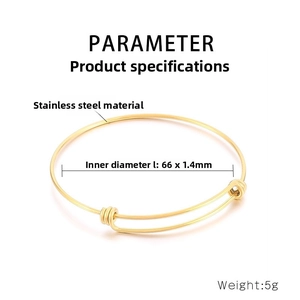 Detail view of 1.4mm wire thickness and 66mm diameter of golden stainless steel bangle