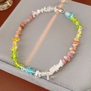Detailed shot of rainbow natural stone beaded anklet with metal extension chain