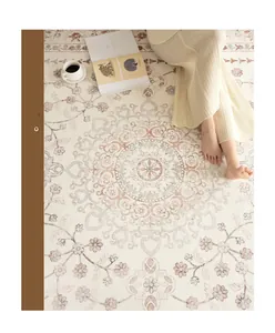 Detail of vintage French carpet with Persian mandala patterns and floral borders
