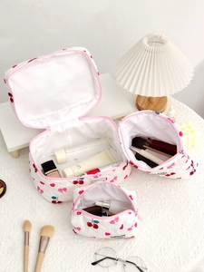 3-piece quilted cotton cosmetic bag set with cherry and bow pattern in various sizes