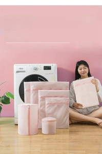 Detailed set of pink mesh laundry bags for bras and delicates in various sizes
