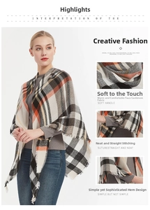Detail view of plaid cashmere-like scarf showing fine stitching and soft texture